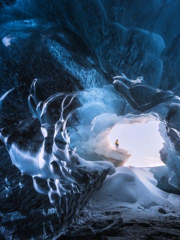 Discover Iceland's blue ice caves through these stunning photographs taken in Vatnajökull glacier.