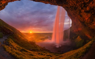 Photograph Seljalandsfoss waterfall from a unique angle on this private South Coast photo tour.