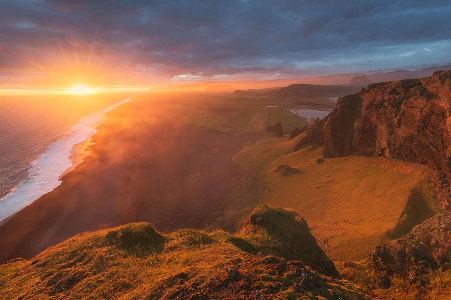 Sunset at Dyrholaey. Photo by: 'Iurie Belegurschi'. Sunset at Dyrholaey. Photo by: 'Iurie Belegurschi'.