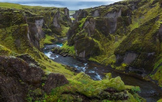 Stunning canyons and luscious flora can be found all over Iceland in the summer.