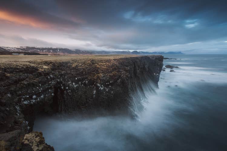 On the coastline of Snæfellsnes, you can watch as the wild waves of the North Atlantic Ocean crash into the sturdy cliffs.