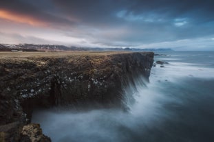 On the coastline of Snæfellsnes, you can watch as the wild waves of the North Atlantic Ocean crash into the sturdy cliffs.