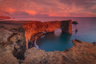 The iconic rock arch at Dyrhólaey, located on the South Coast.