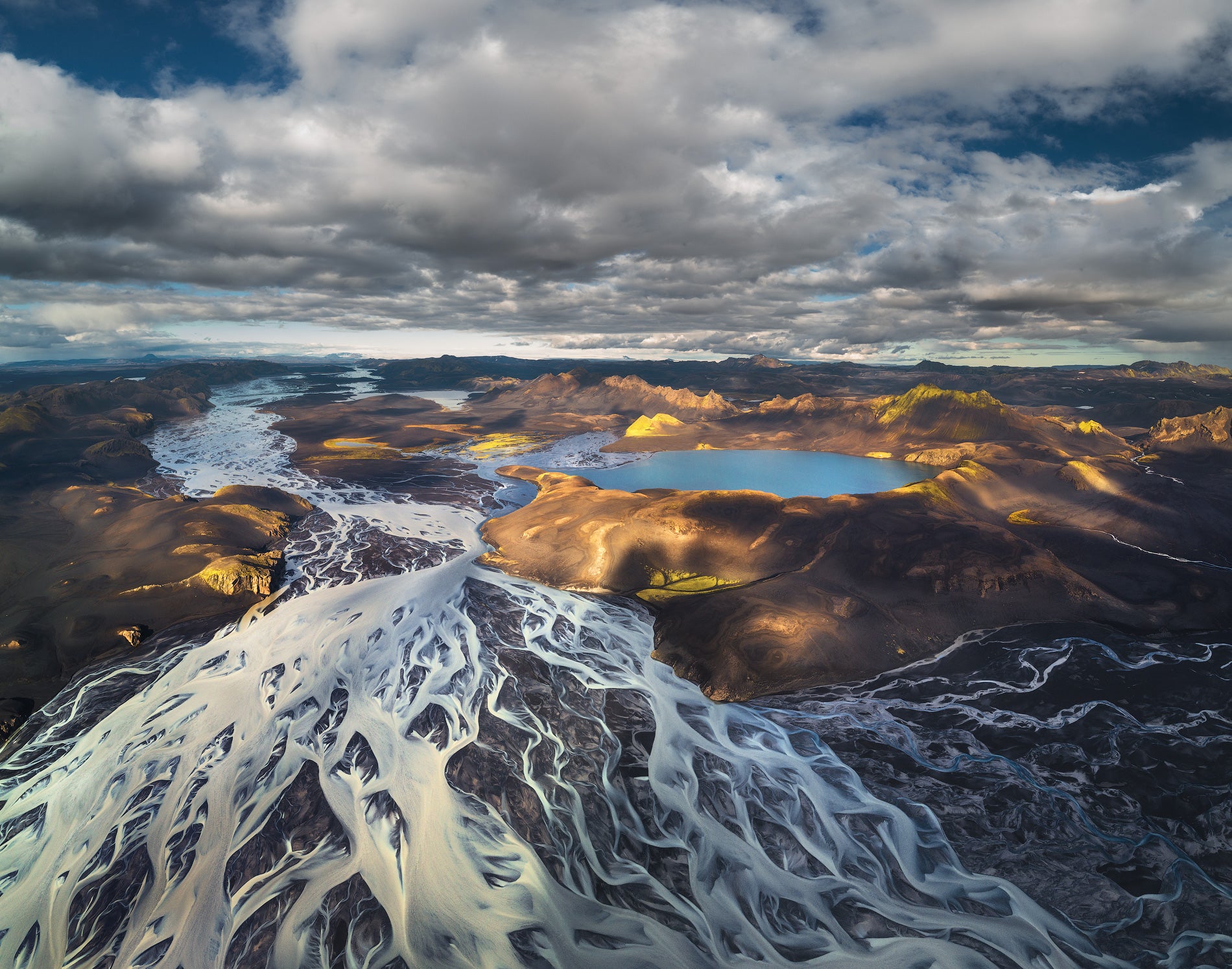 Aerial view of braided river system - Photo by Iurie Belegurschi