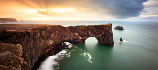 dyrholaey iceland vik reynisdrangar sunrise beautiful landscape rock hole.jpg
