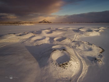 Goðafoss waterfall takes on the appearance a gnarled frozen monster in the wintertime.