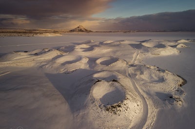 Goðafoss waterfall takes on the appearance a gnarled frozen monster in the wintertime.