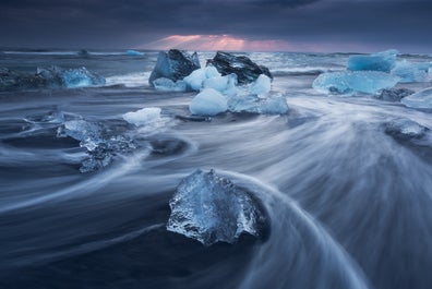 Hundreds of icebergs litter Jökulsárlón glacier lagoon.