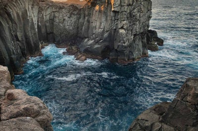 Volcanic cliffs like the shores of Santa Cruz.