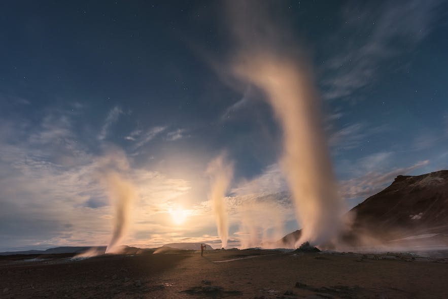 Geysers spout water in the air in a typical Iceland landscape scene - Iceland Photography | Everything You Need To Know&nbsp;