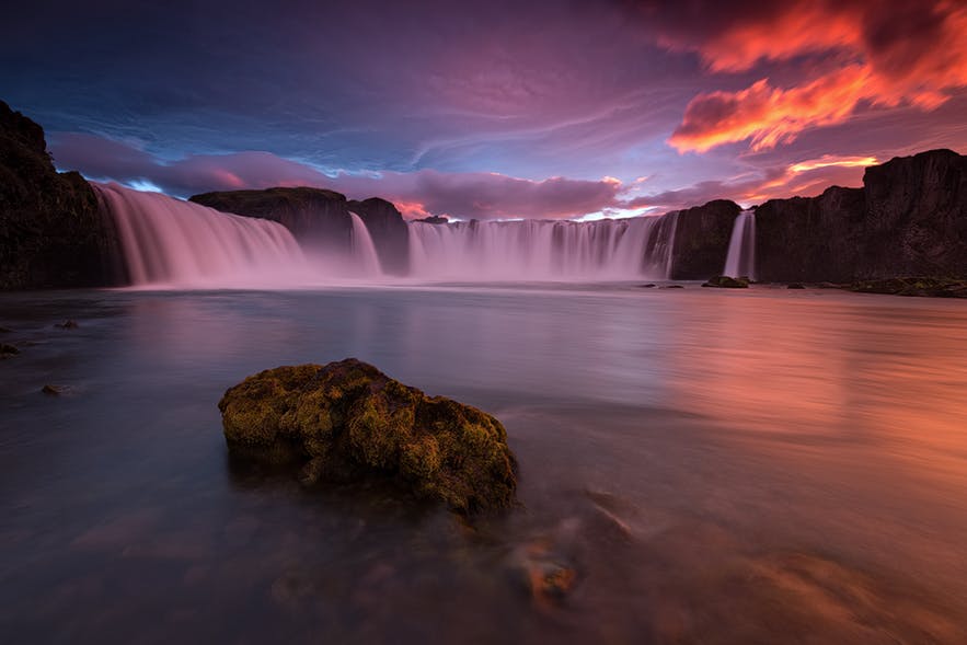 The midnight sun creeps over the Godafoss waterfall - Iceland Photography | Everything You Need To Know