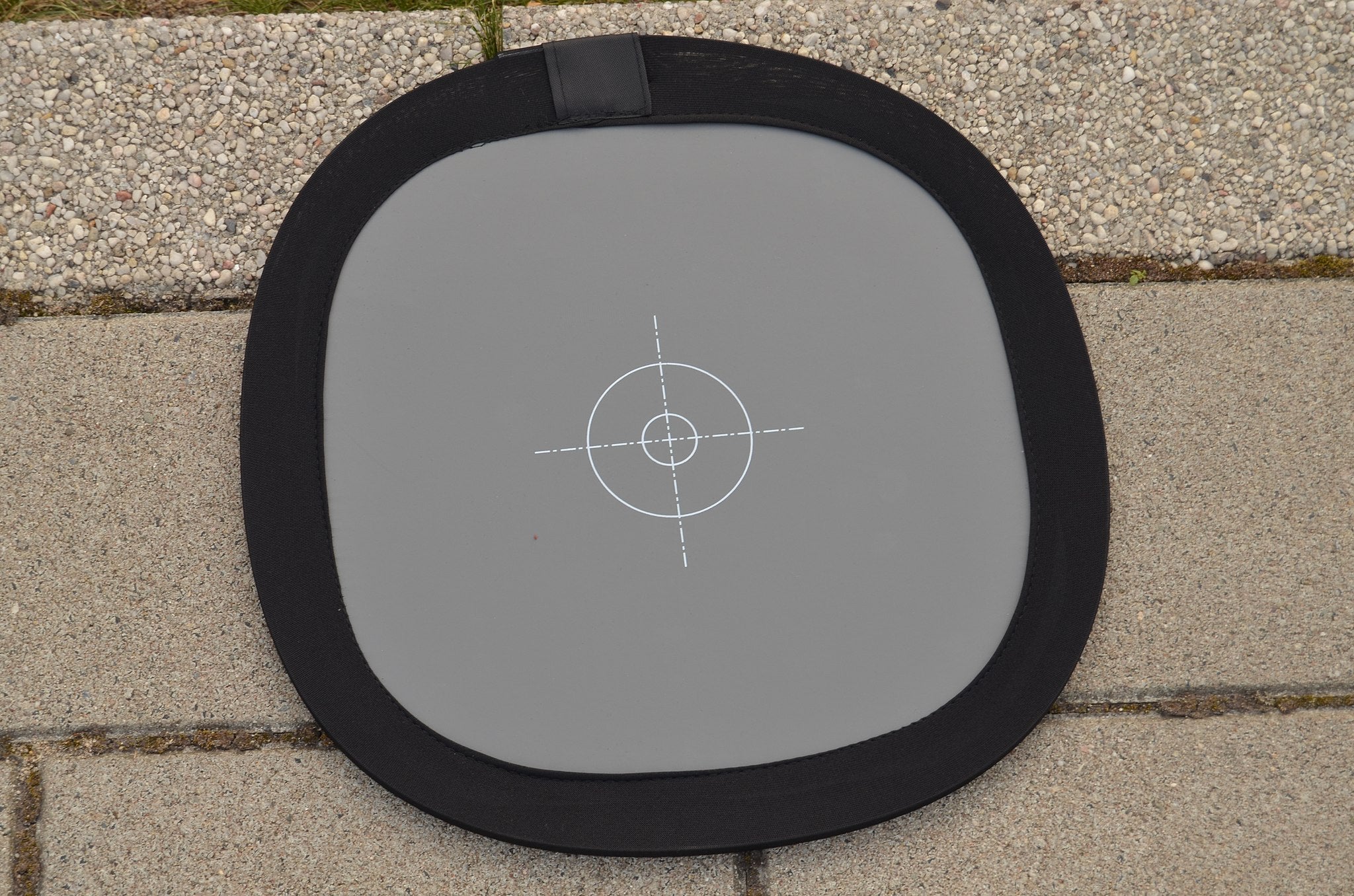 A grey card sits in a white environment&nbsp; | DSLR Accessories