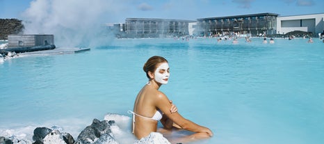 A woman wearing a face mask at the Blue Lagoon spa in Iceland.