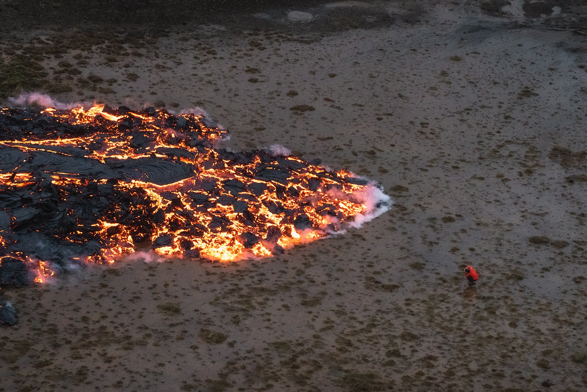 A bold, and socially distanced, photographer in Iceland.