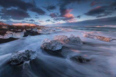 The Diamond Beach in Iceland has beautiful contrasts between its white ice and black sands.