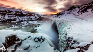 Gullfoss waterfall covered in snow during winter in Iceland.