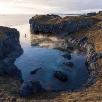 The Sky Lagoon boasts an unbeatable setting with an infinity pool seamlessly blending in with the surrounding volcanic rock and the ocean stretched out beyond.