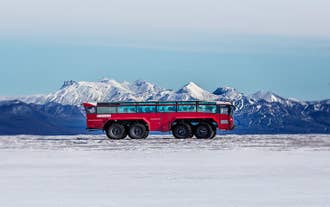 Embark on an epic journey across Langjokull Glacier, the second-largest glacier in Iceland, aboard this fierce red monster truck.