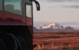 Unleash your sense of adventure as our powerful monster truck takes you on a thrilling journey through the snowy landscapes of Langjokull Glacier.