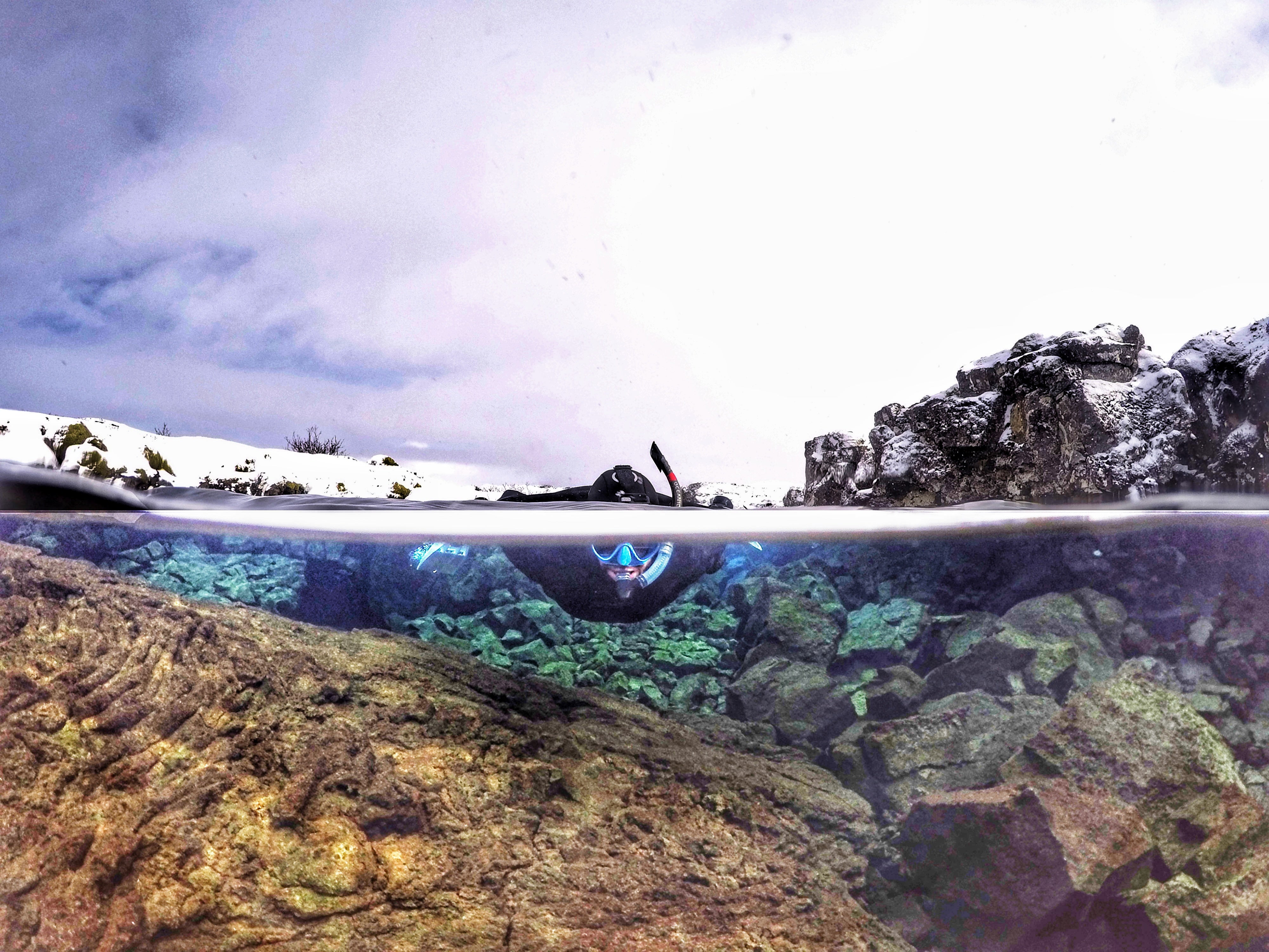 Experience the beauty of Silfra as you snorkel between tectonic plates, with the sky above and the underwater world below.