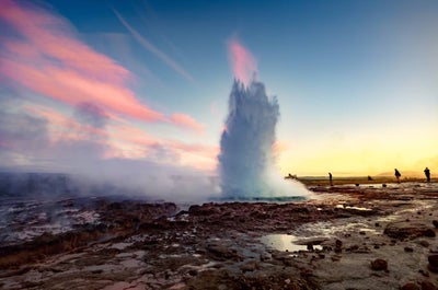 Nature's Fireworks: The mesmerizing eruption of Strokkur geyser paints the Icelandic sky with a burst of natural beauty.