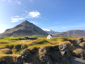 Arnarstapi village is located at the foot of a mountain and along the coast.