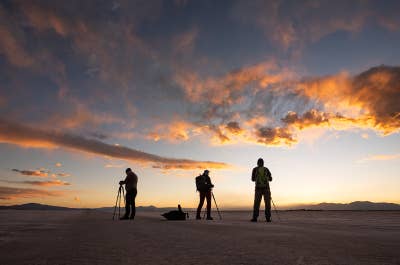A traveler wanders across a salt plain in Puna de Atacama.